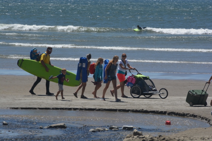 people walking on the beach